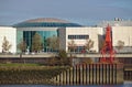 Bremen, Germany - November 6th, 2017 - Glass dome of the Waterfront shopping mall former Space Park with the river Weser, red se Royalty Free Stock Photo