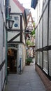 Bremen, Germany - 07/23/2015 - Scenic view of medieval narrow street in Schnoor, half-timbered houses in the centre of the