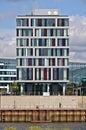 Bremen, Germany - September 14th, 2017 - Modern hotel building with waterfront sidewalk Royalty Free Stock Photo