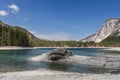 Brenta Dolomites cliffs and rocks around tiny Tovel lake under blue sky,ÃÂ Ville Anaunia, Trentino, Italy Royalty Free Stock Photo