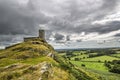 brentor church with moody stormy grey sky