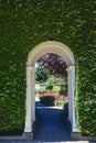 Brentwood Bay, British Columbia, Canada: An archway in a tall hedge at The Butchart Gardens