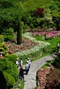 Brentwood Bay, British Columbia, Canada: A small group of visitors exploring the Sunken Garden at The Butchart Gardens