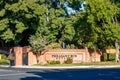 Brentwood, California October 20, 2023: Pheasant Run Estates entrance in Brentwood, California with a gate, green trees and a