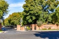 Brentwood, California October 20, 2023: Pheasant Run Estates entrance in Brentwood, California with a gate, green trees and a