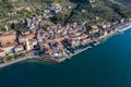 aerial view of Castelletto di Brenzone at Garda Lake,  showing the coastline with roads and the tranquil coastal villages Royalty Free Stock Photo