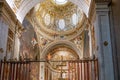 inside the cathedral of Brescia with its beautiful ceiling paintings