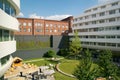 BRESLAU, POLAND - 16 JUN 2018: Green inner courtyard of a five-star city hotel with grandiose architecture and white