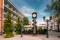 Brest, Belarus. Clock With Arms Of City Of Different Times On Pedestrian Sovietskaya Street In Summer Day.