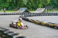 Brest, Belarus - July 27, 2018: Driver in kart wearing helmet, racing suit participate in kart race. Royalty Free Stock Photo