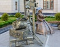 In Brest, at the railway station, not far from ticket offices, a pointer in the form of a lantern is installed. Near a fashionable Royalty Free Stock Photo