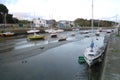 In the Bretagne region, France, the waters receded and the boats sat on the ground. Royalty Free Stock Photo