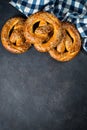 Oktoberfest food beer and bretzel on black.