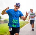 BREVARD, NC-MAY 28, 2016 Agnus Graham, Brevard, NC, runs in the White Squirrel Race with over 350 runners in Brevard, NC 2016.