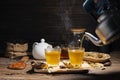 Brew hot tea, chrysanthemum tea, and chrysanthemum flowers. Safflower arranged on a wooden table Healthy drinks to drink herbs and