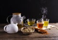 Brew hot tea, chrysanthemum tea, and chrysanthemum flowers. Safflower arranged on a wooden table Healthy drinks to drink herbs and