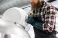 Brewer working at craft brewery or beer plant Royalty Free Stock Photo