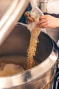 Brewer working in small brewery Royalty Free Stock Photo