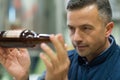 brewery worker inspecting beer bottle Royalty Free Stock Photo