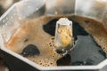 Brewing coffee in a moka pot, close-up view Royalty Free Stock Photo