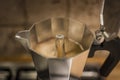 Brewing espresso coffee in a stovetop coffee maker Royalty Free Stock Photo