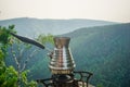 Brewing fresh coffee in a Turk in nature