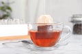 Brewing tea with bag in cup Royalty Free Stock Photo