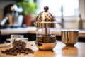 brewing tea with a stainless steel infuser Royalty Free Stock Photo