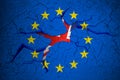Brexit blue european union EU flag on broken crack wall with hole and uk england great britain flag inside Royalty Free Stock Photo