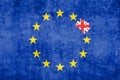 Brexit blue european union EU flag on grunge texture with eraser effect and great britain flag inside
