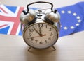 Brexit concept, alarm clock with british and EU flags