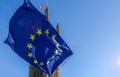 Brexit concept with European union flag juxtapositioned against Victoria tower, Westminster, London, UK