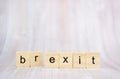 Brexit concept. Brexit word written on wood blocks. Brexit text on wooden table for your desing Royalty Free Stock Photo