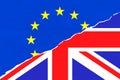 Brexit half blue european union EU flag and half uk england great britain flag on ripped torn paper Royalty Free Stock Photo