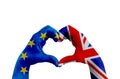 Brexit, hands of man in heart shape patterned with the flag of blue european union EU and flag of great britain uk on the white ba Royalty Free Stock Photo