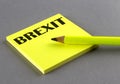 BREXIT text written on a sticky on grey background Royalty Free Stock Photo