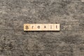 Brexit word written on wood block. Brexit text on cement table for your desing, concept Royalty Free Stock Photo