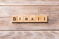 Brexit word written on wood block. Brexit text on wooden table for your desing, concept Royalty Free Stock Photo