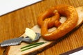 Brezel with butter Royalty Free Stock Photo