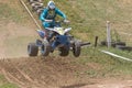 Quad rider in blue jumping in the race Royalty Free Stock Photo