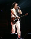 Brian May with Queen performs in concert