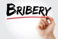 Bribery text with marker Royalty Free Stock Photo