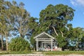 Bribie Island Queensland Australia - Tourist sit in park shelter under huge trees enjoying the day on the Sunset Coast