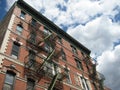 Brick Apartment Building Against Sky