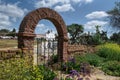 brick arch gate at historic California mission San Luis Rey