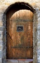 Brick arch with wooden doors Royalty Free Stock Photo