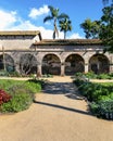 Brick Arches, Corridor and Garden of Famous Mission San Juan Capistrano. Royalty Free Stock Photo