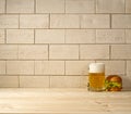 Brick background, beer and burger