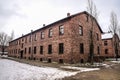 Oswiecim / Poland - 02.15.2018: Brick barracks, block houses of the Auschwitz Concentration Camp Museum. Royalty Free Stock Photo