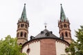 Brick Bell towers of WÃÂ¼rzburger Cathedral on cloudy sky Royalty Free Stock Photo